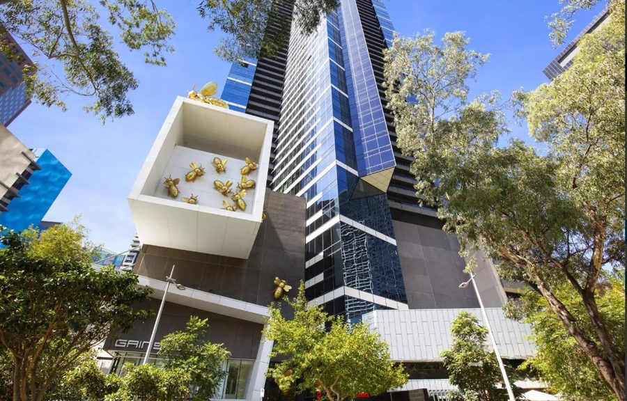 Southbank apartment tower with golden bee sculptures